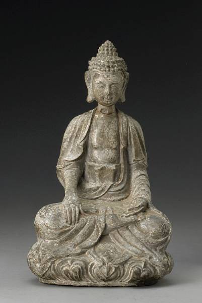 Appraisal: A carved stone figure of a seated Buddha The soft