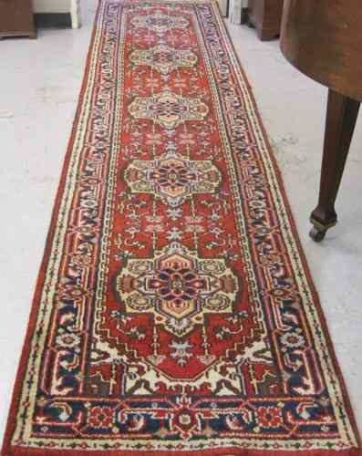 Appraisal: HAND KNOTTED ORIENTAL HALL RUNNER Pakistani-Caucasian ' '' x '