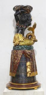 Appraisal: Italian polychrome decorated and partial gilt blackamoor Italian polychrome decorated