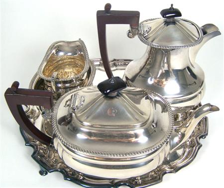 Appraisal: A four piece tea and coffee service Adie Brothers Birmingham