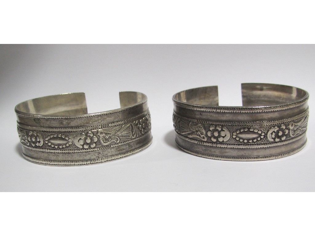 Appraisal: Pair of silver Middle Eastern grade silver bangles Approximately oz