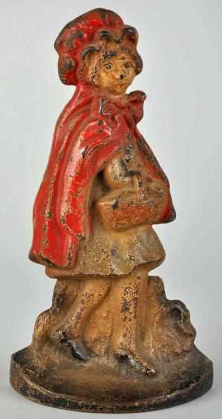 Appraisal: Cast Iron Little Red Riding Hood Doorstop Description Marked Copyrighted