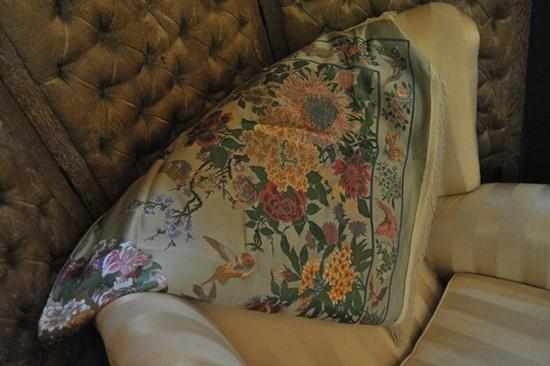 Appraisal: A SILK THROW IN FLORAL THEME