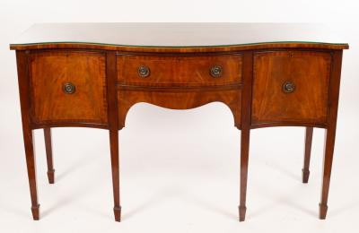 Appraisal: A Regency style mahogany and boxwood strung serpentine sideboard the