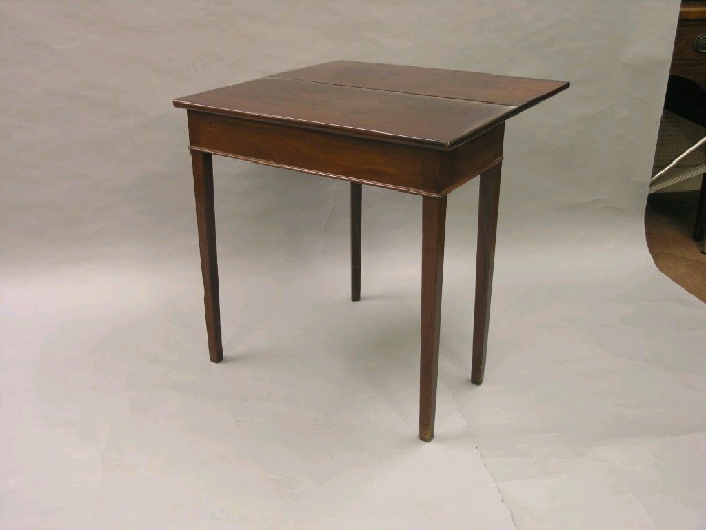 Appraisal: A small George III mahogany tea table rectangular shape with