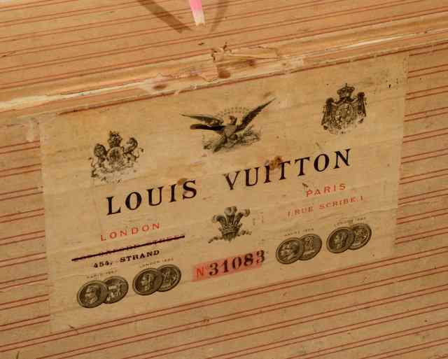 Appraisal: A LOUIS VUITTON WOODEN BOUND TRUNK labelled and numbered with