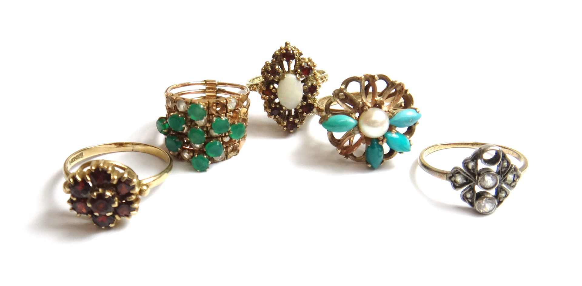 Appraisal: A gold green and colourless gem set ring in a