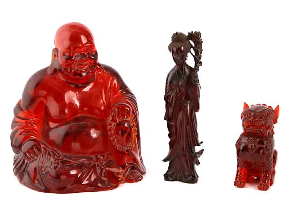 Appraisal: A group of Chinese cherry resin and composition figures height