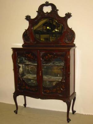 Appraisal: A VICTORIAN MAHOGANY PARLOUR CABINET in the rococco revival style