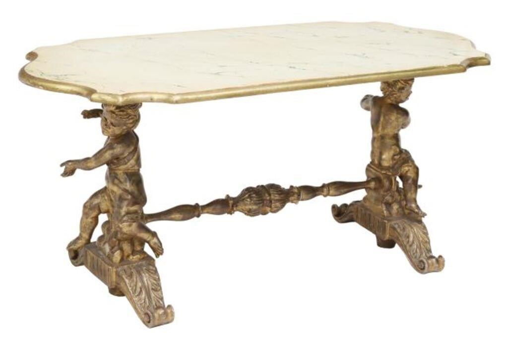 Appraisal: Italian coffee table th c cartouche-shape top in a painted