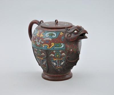 Appraisal: A Chinese Phoenix Head Bronze Cloisonne Teapot with Lid Ming