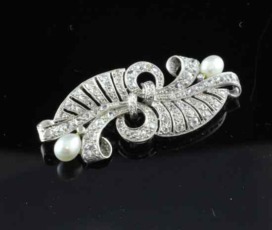 Appraisal: A 's diamond and cultured pearl set white gold scroll