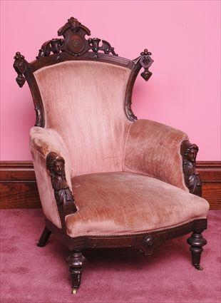 Appraisal: AMERICAN RENAISSANCE REVIVAL BRASS-MOUNTED CARVED AND INCISED WALNUT ARMCHAIR IN