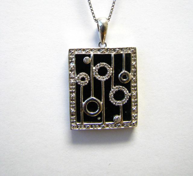 Appraisal: Designer Sterling and Diamond Pendant with chain unmarked