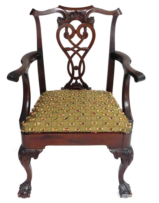 Appraisal: Chippendale style armchair pierced splat with carved bird heads armrest