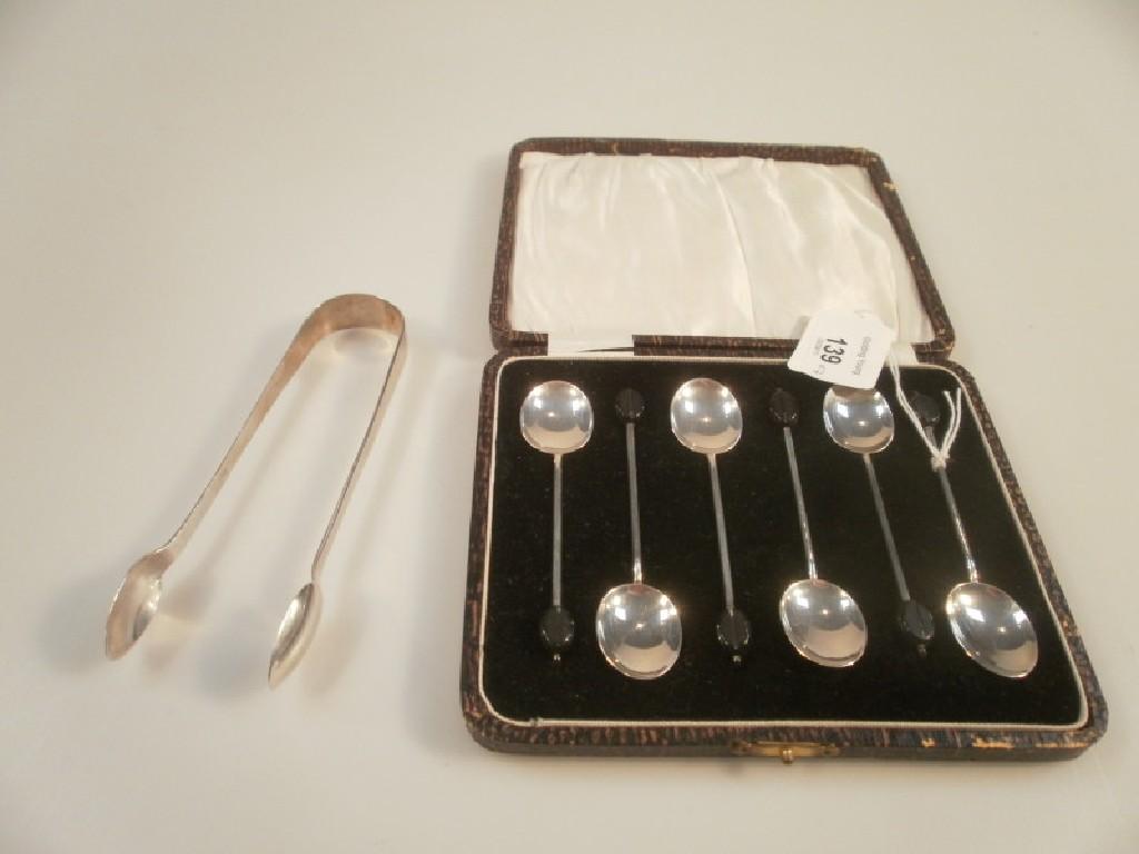 Appraisal: A boxed set of six silver coffee spoons with ebonised