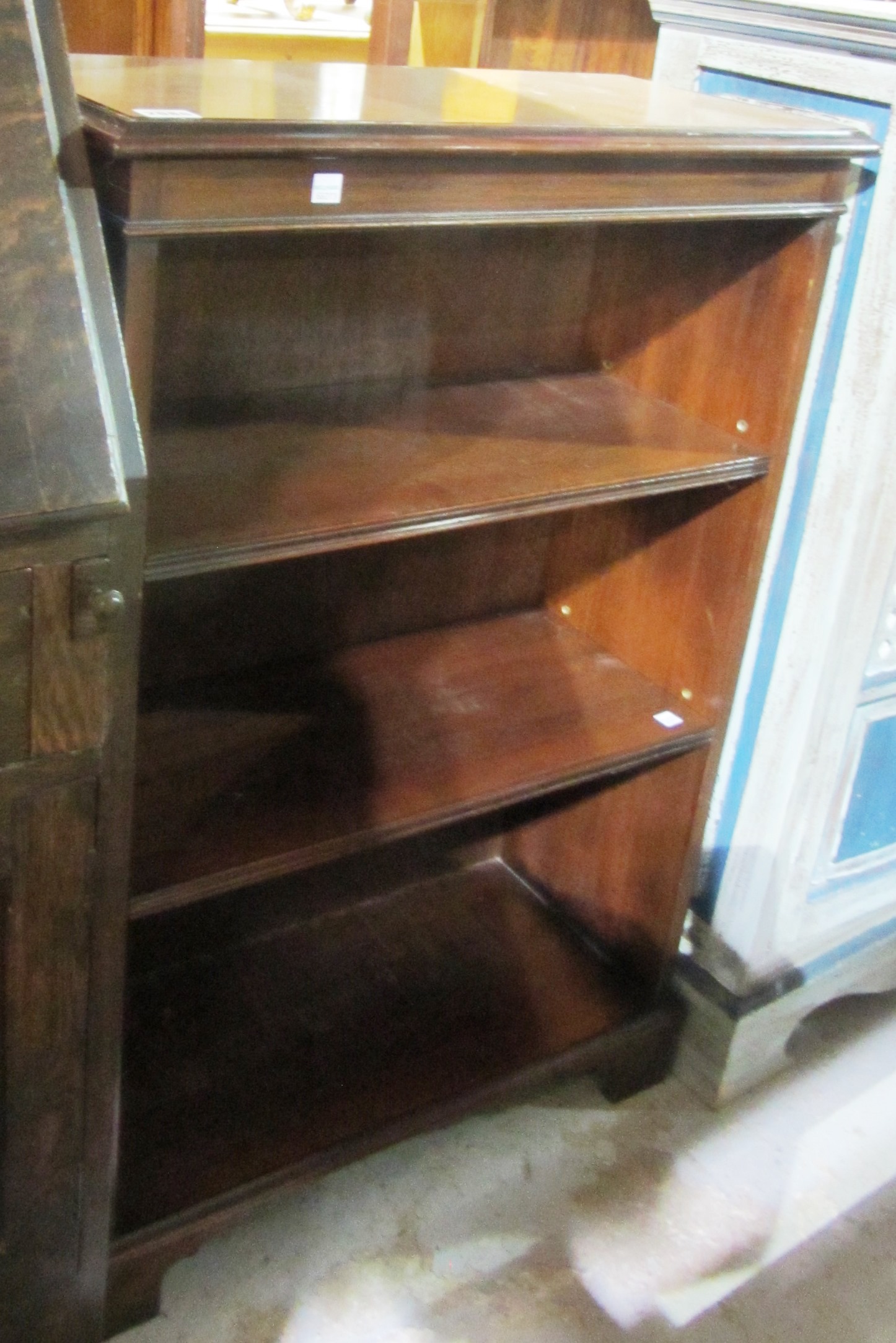 Appraisal: A small mahogany open bookcase