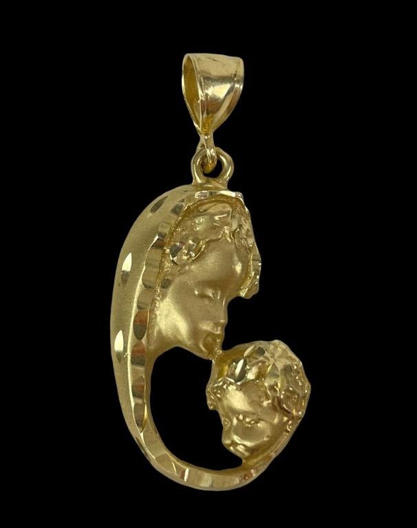 Appraisal: K Gold Mary Child PendantMarked K on pendant and bail