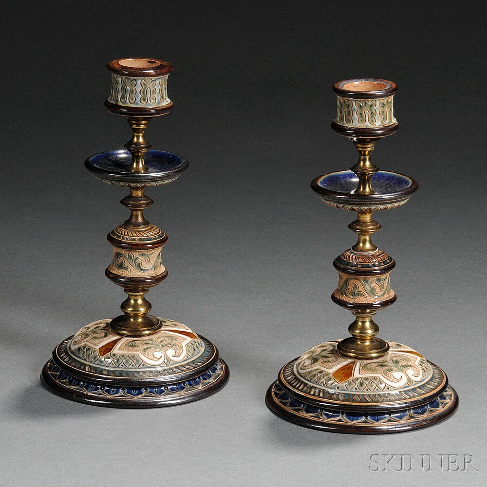 Appraisal: Pair of Doulton Lambeth Frank Butler Decorated Stoneware Candlesticks England