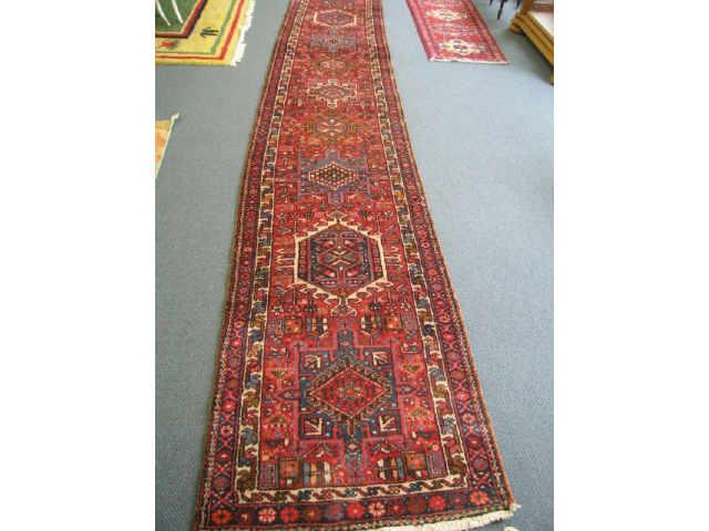 Appraisal: Heriz Persian Handmade Runner medallion on red field ' x