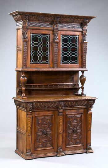 Appraisal: Carved Oak and Leaded Glass Cabinet ca in the Henri