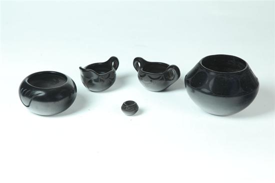 Appraisal: FIVE PIECES OF AMERICAN INDIAN POTTERY Twentieth century blackware The