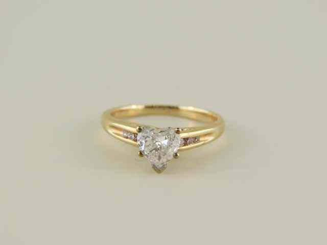 Appraisal: Diamond Ring carat heart shape diamond with diamonds on each