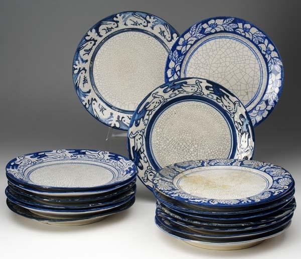 Appraisal: DEDHAM Seventeen dinner plates five in the Turkey pattern staining