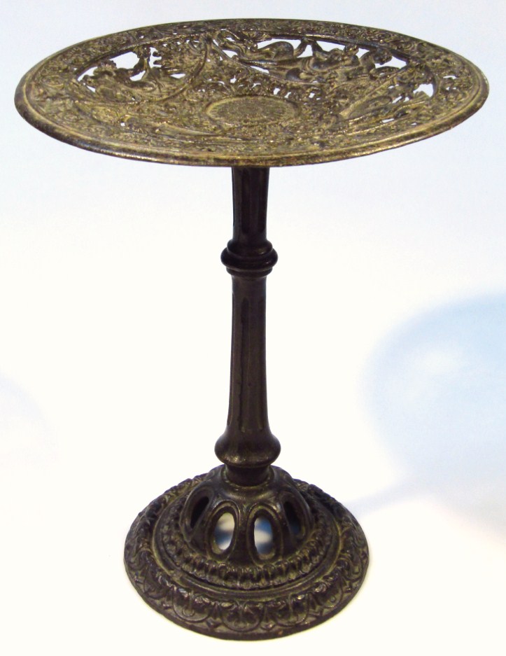 Appraisal: A thC cast metal tazza the dished part pierced circular