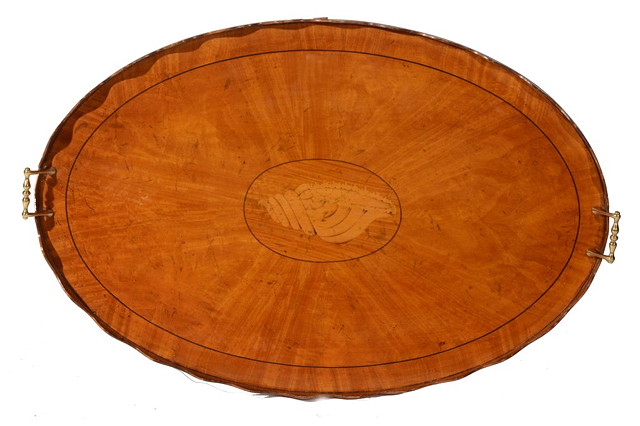 Appraisal: A TH CENTURY OVAL SATINWOOD TRAY with brass handles and