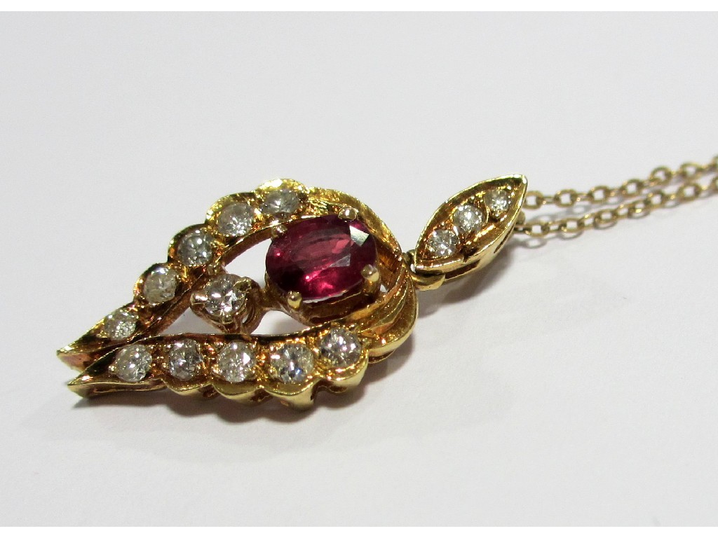 Appraisal: A twenty two carat gold ruby and diamond set pendant