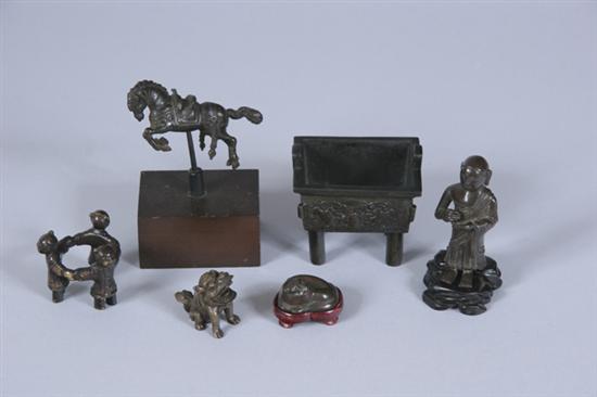 Appraisal: SIX CHINESE BRONZE FIGURES th th century Figure of prancing