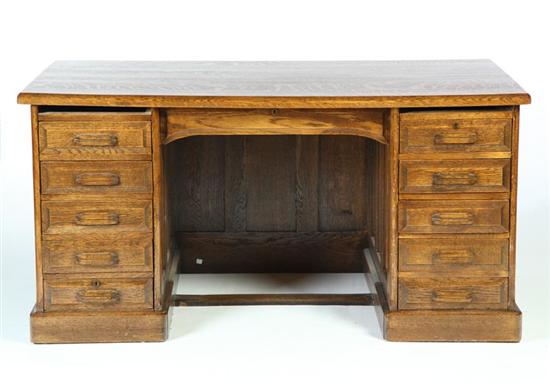 Appraisal: GOLDEN OAK ERA KNEEHOLE DESK American early th century quarter