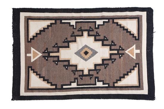 Appraisal: TWO GREY HILLS RUG Twentieth century Central hooked diamond motif