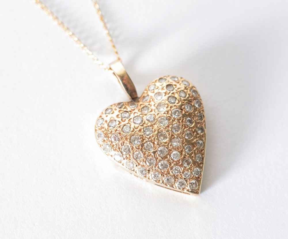 Appraisal: DIAMOND HEART PENDANT NECKLACE K gold diamond heart pendant contains