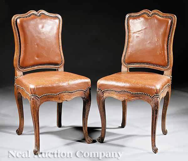 Appraisal: A Pair of Louis XV Provincial Carved Walnut Side Chairs