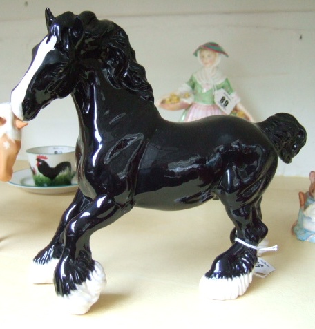 Appraisal: A Beswick horse modelled as a cantering shire BCC