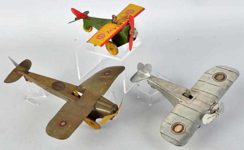 Appraisal: Lot of Tin Airplane Wind-Up Toys American Includes one Strauss