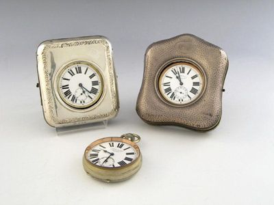 Appraisal: Three silver mounted watch case covers two of rectangular arched