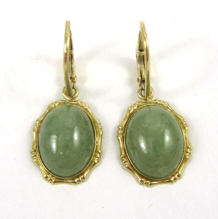 Appraisal: PAIR OF JADE AND FOURTEEN KARAT GOLD EARRINGS each yellow