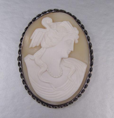 Appraisal: LARGE CAMEO BROOCH IN STERLING FRAME Carved shell cameo depicting