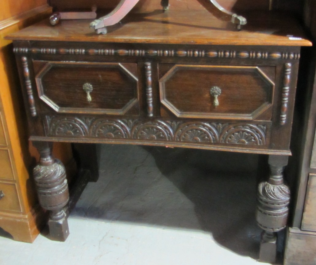 Appraisal: An th century style oak chest with single drawer and