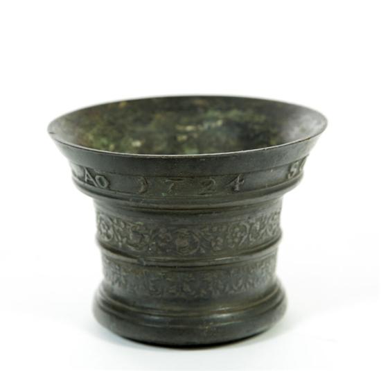 Appraisal: BRONZE MORTAR Netherlands th century Small mortar with cast designs