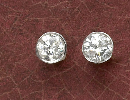 Appraisal: DIAMOND STUD EARRINGS k white gold pierced earrings with two