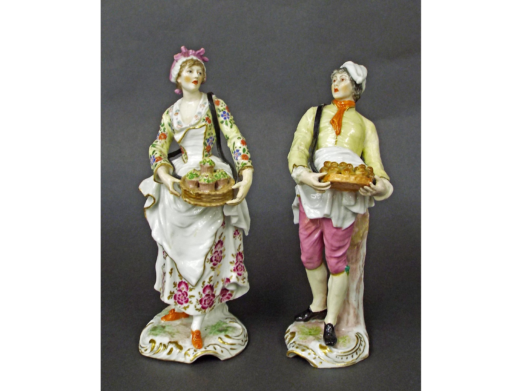 Appraisal: Pair of th century German porcelain figures modelled as street