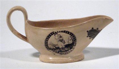 Appraisal: Black transfer-printed creamer Of oval form H in PROVENANCE From