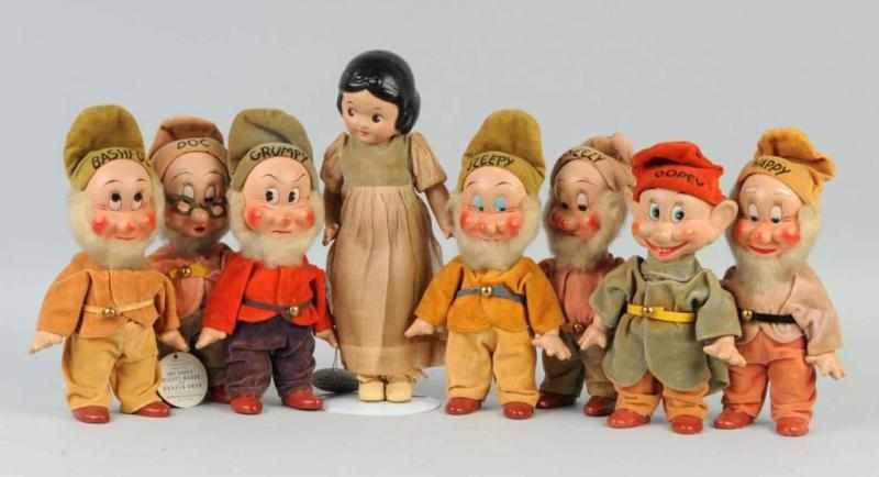 Appraisal: Knickerbocker Composition Snow White Dwarfs Description Lovely Set with molded