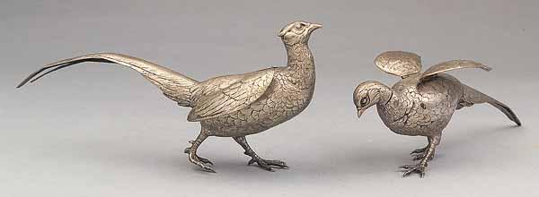 Appraisal: A Pair of Continental Silver Gilt Pheasants each with movable