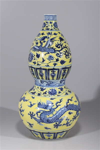 Appraisal: Chinese porcelain double gourd vase with phoenix and dragon designs