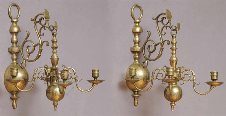 Appraisal: PAIR OF DUTCH BAROQUE STYLE BRASS WALL APPLIQUES SUPPORTING SMALL